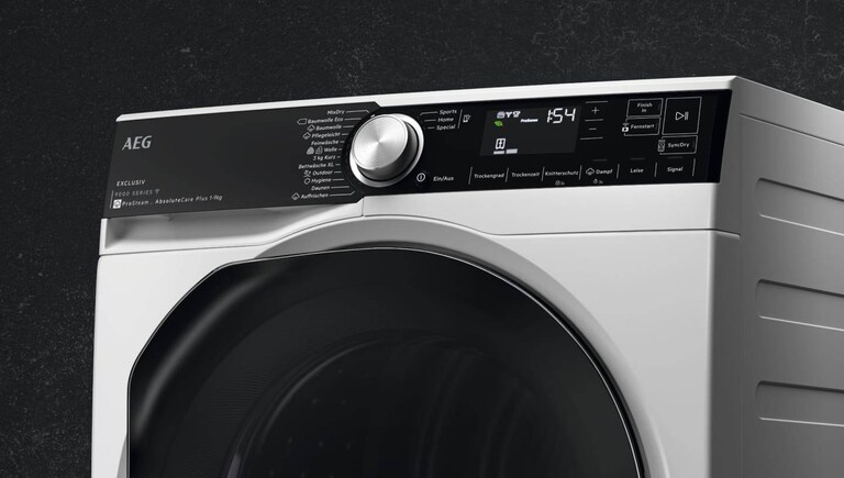 Máquina de lavar e secar AEG com um fundo preto